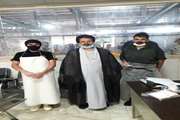 اهداء کارت هدیه به دو نفر از کارکنان کشتارگاه دام استان قم